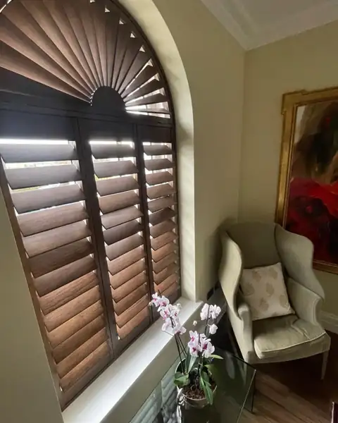 Made to measure arched hardwood shutters