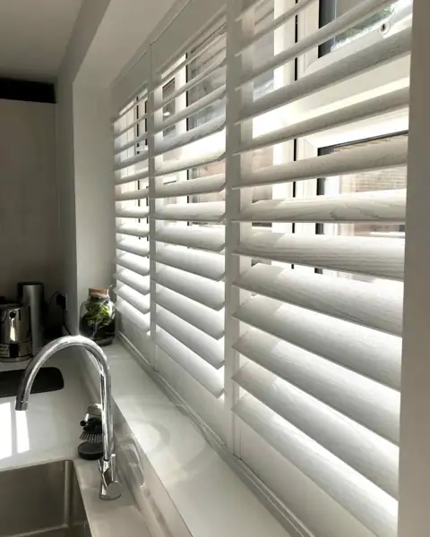 Living Rooms with hardwood shutters